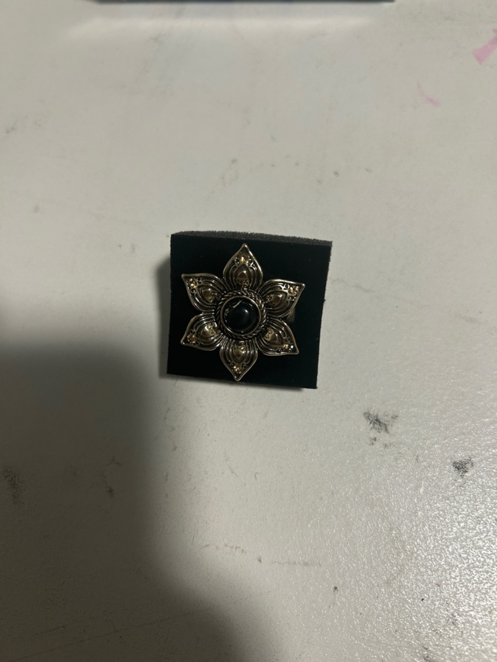 Gold Floral Statement Brooch with Black Center